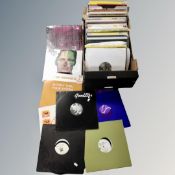 A box of vinyl records