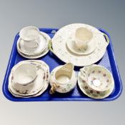 A tray of china including Belleek plate, jug, cup, china trios etc.