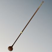 A vintage copper and brass hunting horn,