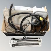 A box of electric tile cutter, further manual tile cutter,