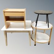 A contemporary two tone square coffee table together with circular table,