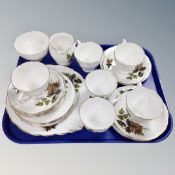 A twenty one piece Royal Stafford beechwood bone china tea service