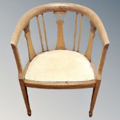 A 19th century inlaid mahogany tub armchair