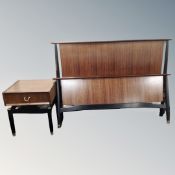 A mid 20th century G-plan E Gomme 4'6 bed frame with bedside stand fitted with a drawer