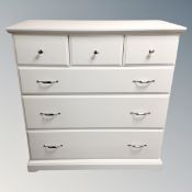 A contemporary six drawer chest