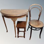 A walnut D-shaped hall table together with bentwood chair and wooden plant stand