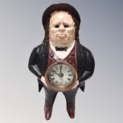 An antique cast iron figural clock modelled as John Bull