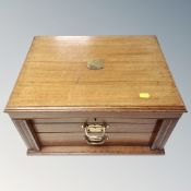 An antique cutlery canteen retailed by Goldsmiths Company of Newcastle containing part plated and