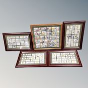 Five frames containing Wills cigarette cards, dogs, flowers,