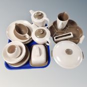 Twenty-nine pieces of 20th century Poole tea and dinner ware, lidded butter dish,
