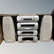 A Technics four piece separates music centre with speakers