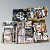 Four boxes of assorted DVD's and Trivial Pursuit board game,