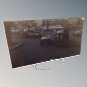 A Panasonic 50 inch LCD smart TV with remote