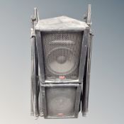 A pair of Stagg professional mixer amplifier speakers on tripod stands