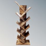 A set of contemporary Vasagle angled bookshelves,