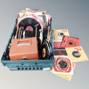 A crate of vinyl 7 inch singles and 78's including Rolling Stones, Stevie Wonder,