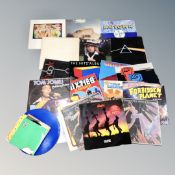 A box of vinyl records, Rod Stewart, The Stranglers, Pink Floyd, The Beach Boys,