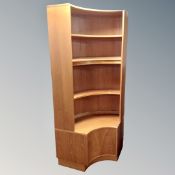 A mid 20th century G-plan corner shelving unit