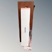 A Singer HI-memory knitting machine with accessories on folding table