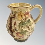 A Woods Indian tree embossed jug