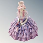 A Royal Doulton figure,