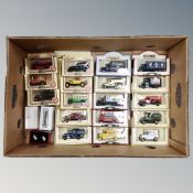 A box of die cast vehicles, Lledo, Day's Gone and Hamleys vehicles, enamelled badge,