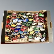 A box containing a quantity of Corgi Classics and Lledo Days Gone delivery vans.