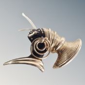 A Deco style brooch depicting an African princess.