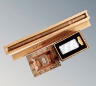 A Giant dictador boxed cigar together with a USB lighter and aztec ashtray