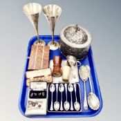 A tray of horn beaker, plated tea and serving spoons, gilt dress studs,