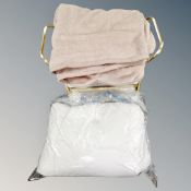 An Eternal Beau gilt three tier serving trolley together with a woolen throw and a duvet.