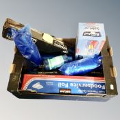 A box containing catering foil, cling film and freezer bags.