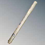 An antique brass telescope.