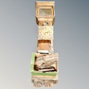 A Victorian oak cased grandfather clock with brass dial, pendulum, weight and key.