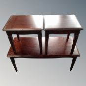 A nest of three Stag Minstrel tables.