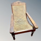 A bergere steamer armchair.
