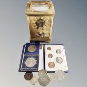 A Rapport brass cased carriage clock together with assorted coinage including Britain's First