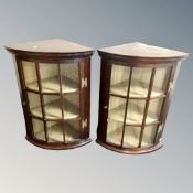 A pair of Chapmans Siesta glazed corner cabinets.