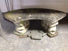 A concrete shaped garden bench on koi pedestals, together with a further No Fishing sign.