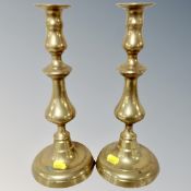 A pair of Victorian brass candlesticks.