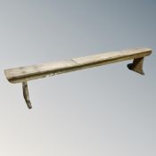 A vintage pine bench.