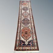 A Caucasian-design runner,
