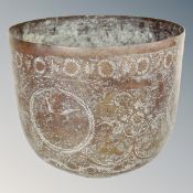 A heavy brass jardiniere