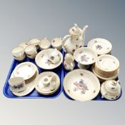 Two trays of Continental gilded floral tea and dinnerware.