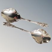 A pair of silver serving spoons, London 1908.