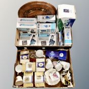 Two boxes containing commemorative china, student microscopes, computer games, indoor golf set etc.