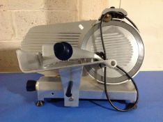 An Etal commercial meat slicer.