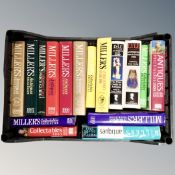 A box containing a quantity of antique price and collector's guide books.