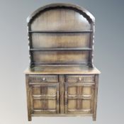 A Priory oak double door Dutch dresser.