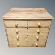 A 19th century pine two over three five drawer chest with knob handles.